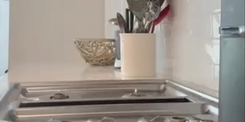 Stainless steel stovetop and backsplash cleaned in detail, the kind of kitchen extra a cleaning add-on can include in Frederick, MD