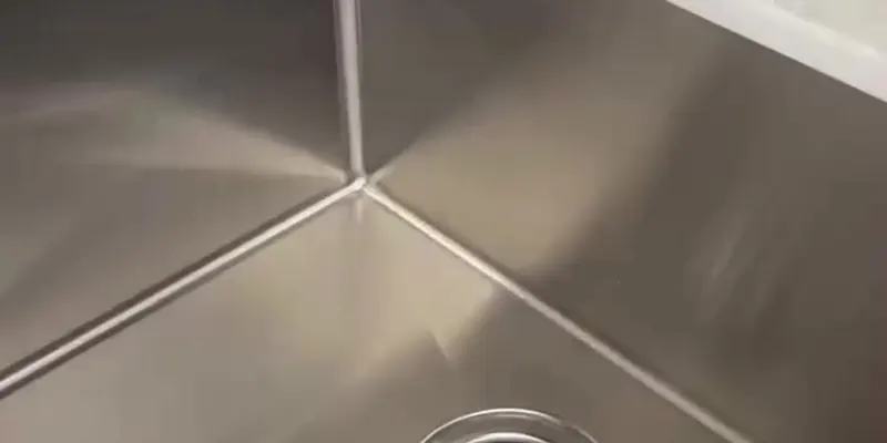 Stainless steel kitchen sink scrubbed and polished (Deep Cleaning by TCS Cleaning Service)